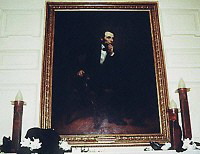 Candleholders on fireplace mantle in the State Dining Room